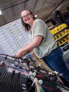DECA team member and large wire harness